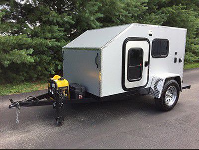 Photo of Silver Teardrop Camper with Generator